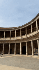 Tourist captures Palace of Charles V courtyard in Granada