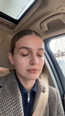 Woman photographed in BMW interior, Tbilisi morning