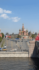 Morning scenes around Red Square show tourists, military presence