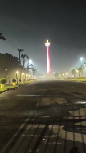 Evening scenes captured around illuminated Monas monument in Jakarta