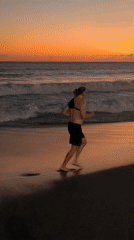 Woman relaxes in tropical setting, North Kuta Indonesia