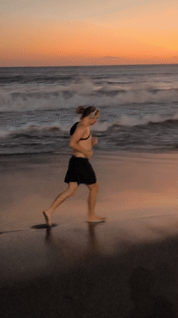 Woman relaxes in tropical setting, North Kuta Indonesia