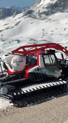 Snow groomer parked on alpine slope in Garmisch-Partenkirchen