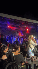 Outdoor concert night in Argelès-sur-Mer with stage lights and crowd