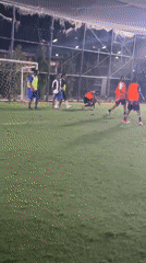 Evening soccer match played on artificial turf in Nigeria