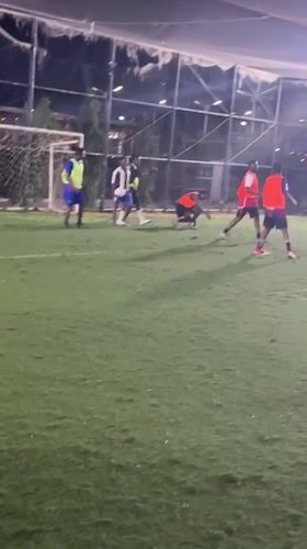 Evening soccer match played on artificial turf in Nigeria