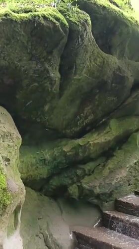 Tourists document waterfalls, chapel, forest scenes at Russian thermal resort