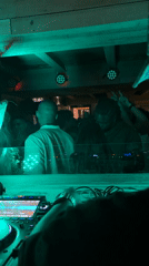 DJ performs at green-lit Mexico City club