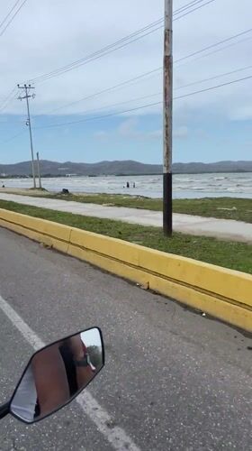 Motorcyclist records coastal road journey in Higuerote, Venezuela
