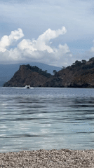 Motorboat spotted crossing Turkish waters near rocky island