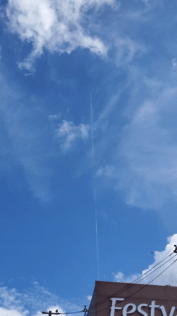 Aircraft contrails and cloud formations observed over Curitiba skies