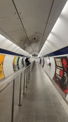 Commuter documents crowded London Underground journey during evening rush