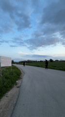 Person performs backflip in rural field near Shumen, Bulgaria