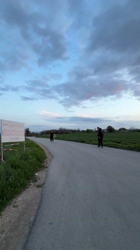 Person performs backflip in rural field near Shumen, Bulgaria