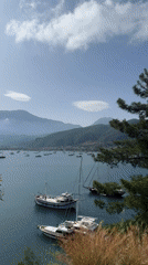 Morning views captured of Fethiye Bay with sailboats, mountains
