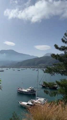 Morning views captured of Fethiye Bay with sailboats, mountains