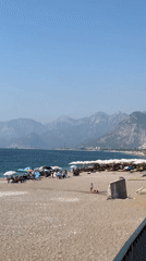 Konyaaltı Beach buzzes on a sunny August morning