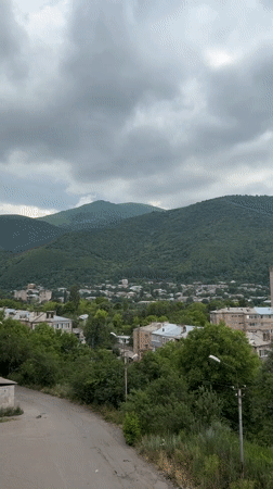 Police presence and dumpster search on a Vanadzor street