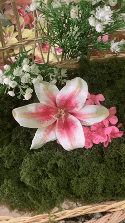Artificial floral displays in wicker baskets, Kuala Pembuang
