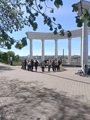 Morning exercise group gathers in Izhevsk park amid spring blooms