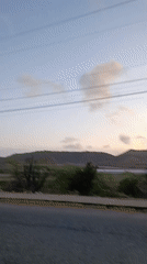Vehicle records roadside scenery in Juan Griego, Venezuela