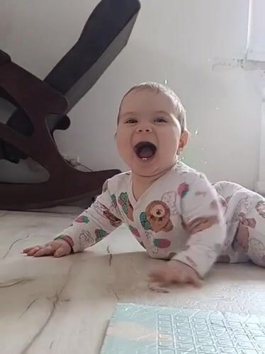 Baby laughs, candy unwrapped in Russian village moments