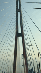 Vehicle crosses Russky Bridge in Vladivostok, Russia
