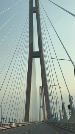 Vehicle crosses Russky Bridge in Vladivostok, Russia