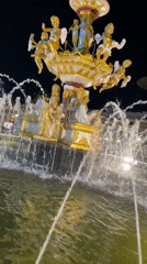 Ornate fountains and nighttime lights at a Pattaya attraction