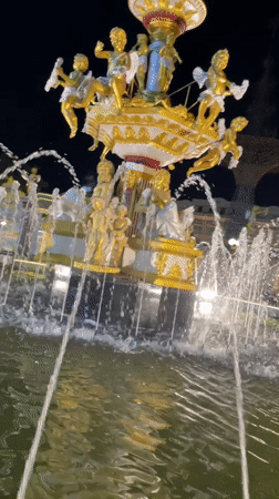 Ornate fountains and nighttime lights at a Pattaya attraction