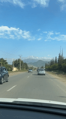 Traffic flows on mountain road in Ourika, Morocco