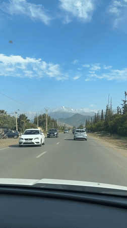 Traffic flows on mountain road in Ourika, Morocco