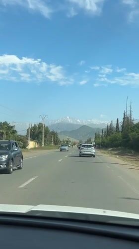 Traffic flows on mountain road in Ourika, Morocco