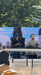 DJs perform at casual outdoor gathering in Milan park