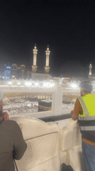Evening at the Grand Mosque, Mecca — crowds, the Kaaba, clock tower