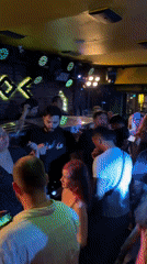 Chiang Mai nightlife district bustling with crowds, dancing, entertainment