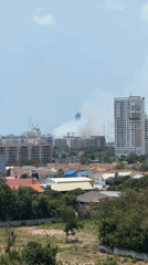 Fire smoke visible across Pattaya cityscape during morning hours