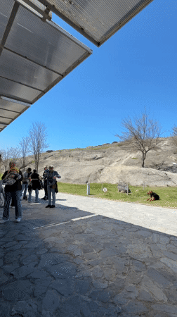 People gather at outdoor meeting spot in Kvakhvreli, Georgia