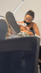 Beauty technician applies eyelash extensions in Saint-André-le-Puy salon