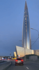 Saint Petersburg's iconic glass skyscraper seen from a moving vehicle