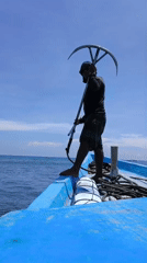Man with grapnel hook spotted on boat in Indonesian waters