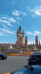 Traffic stops near brick building in Barcelona Monday afternoon