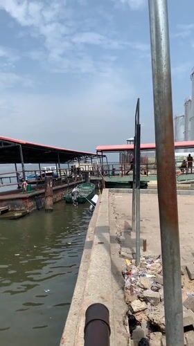 Ordinary waterfront life documented along Lagos Lagoon in Ibasa