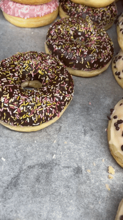 Colorful donuts with various toppings displayed in Dronten