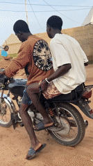 Morning scenes captured in Jawu: motorbike riders, wandering sheep