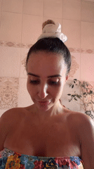 Multi-step skincare routine in a Novosibirsk bathroom