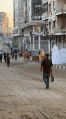 Cleanup crews and daily life on damaged Gaza City streets