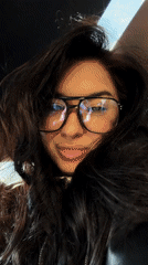 Woman records selfie video in Moscow wearing leather jacket