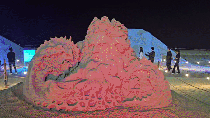 Colorful illuminated sand sculptures draw crowds at Busan beach