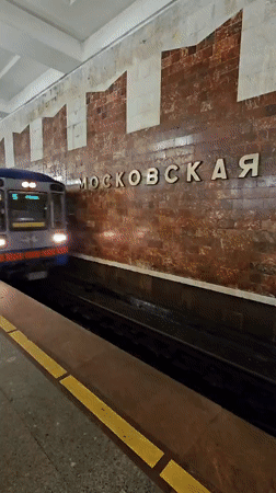Evening metro ride through Nizhny Novgorod at golden hour